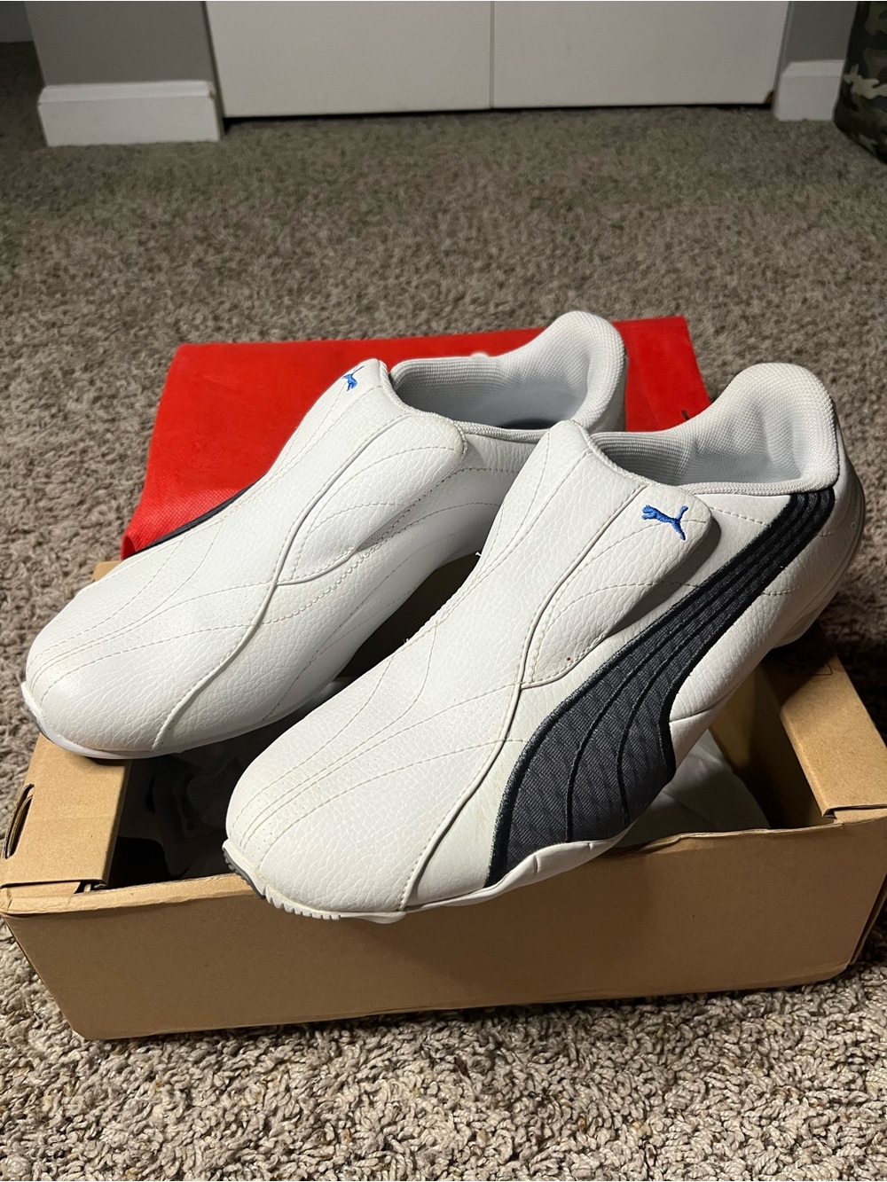 Puma Men’s White Slip-On Sneakers with Black Stripe and Blue Logo